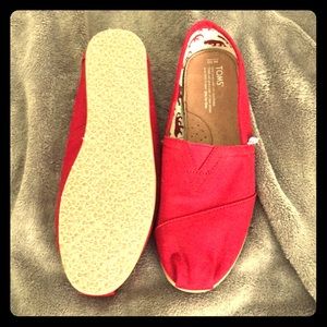 Men’s size 10 Toms. Never worn.